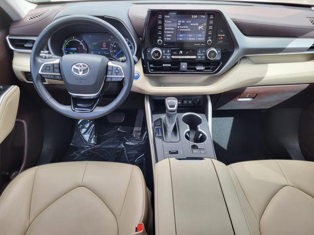 used 2021 Toyota Highlander Hybrid car, priced at $41,999