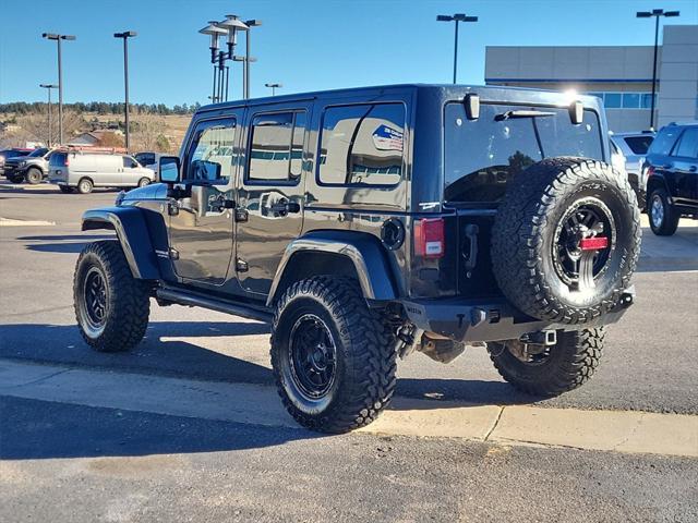 used 2013 Jeep Wrangler Unlimited car, priced at $17,998