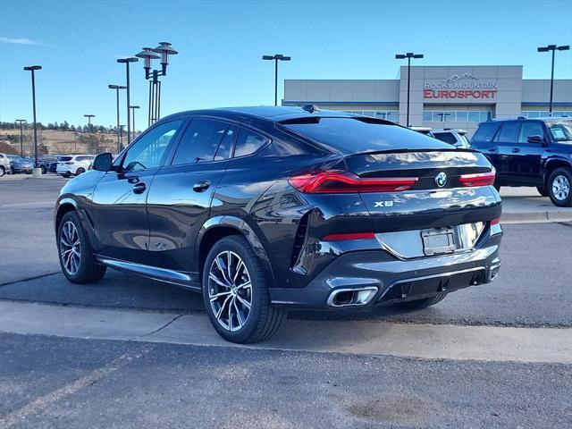 used 2025 BMW X6 car, priced at $68,698