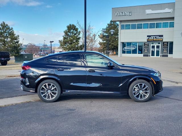 used 2025 BMW X6 car, priced at $68,698