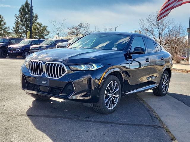 used 2025 BMW X6 car, priced at $68,698