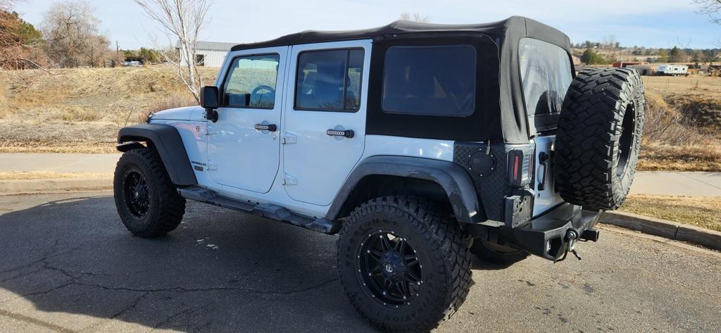 used 2015 Jeep Wrangler Unlimited car, priced at $16,999