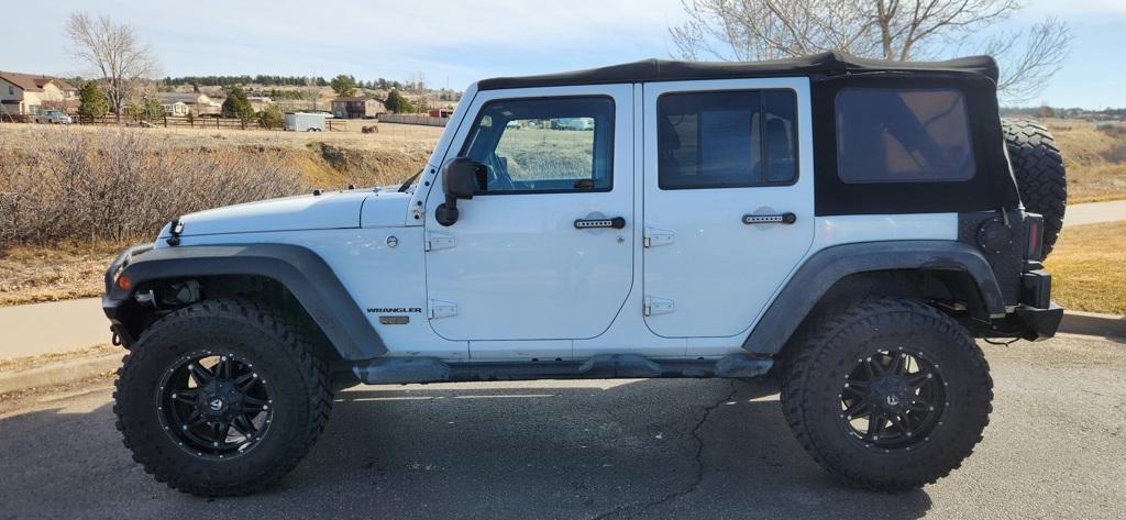 used 2015 Jeep Wrangler Unlimited car, priced at $16,999