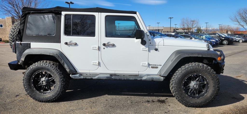 used 2015 Jeep Wrangler Unlimited car, priced at $16,999