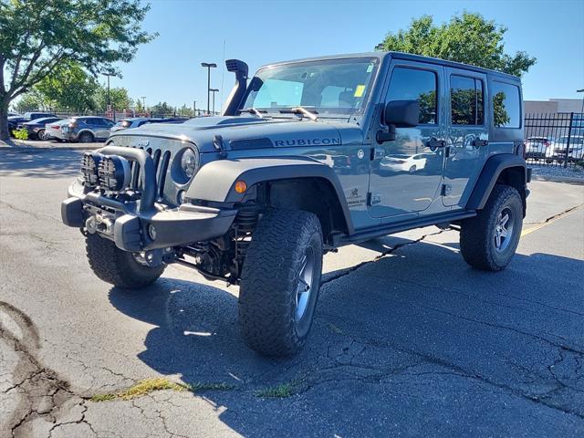 used 2014 Jeep Wrangler Unlimited car, priced at $23,498