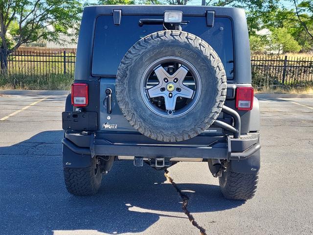 used 2014 Jeep Wrangler Unlimited car, priced at $23,498