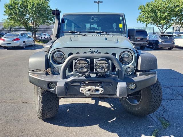 used 2014 Jeep Wrangler Unlimited car, priced at $23,498