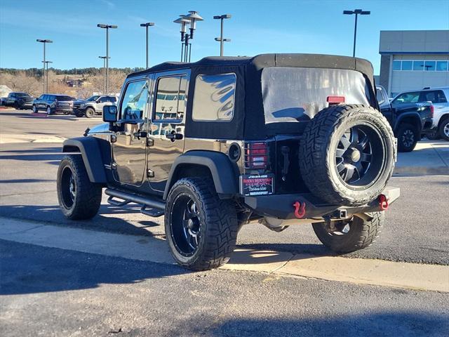 used 2013 Jeep Wrangler Unlimited car, priced at $17,998