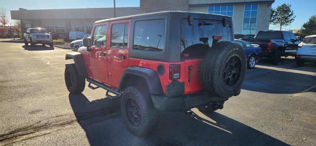 used 2013 Jeep Wrangler Unlimited car, priced at $18,599