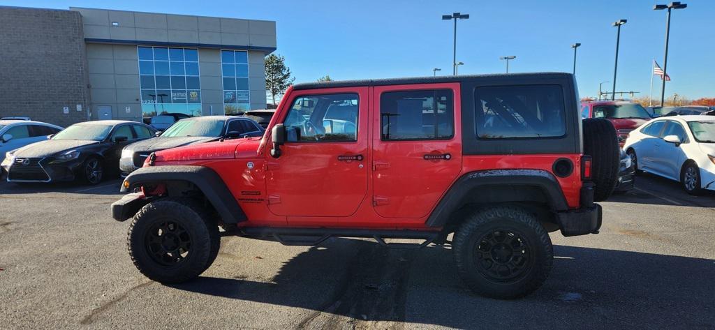 used 2013 Jeep Wrangler Unlimited car, priced at $18,599