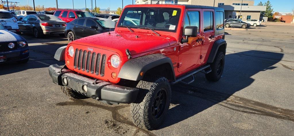 used 2013 Jeep Wrangler Unlimited car, priced at $18,599