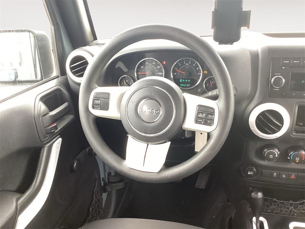used 2015 Jeep Wrangler Unlimited car, priced at $12,740
