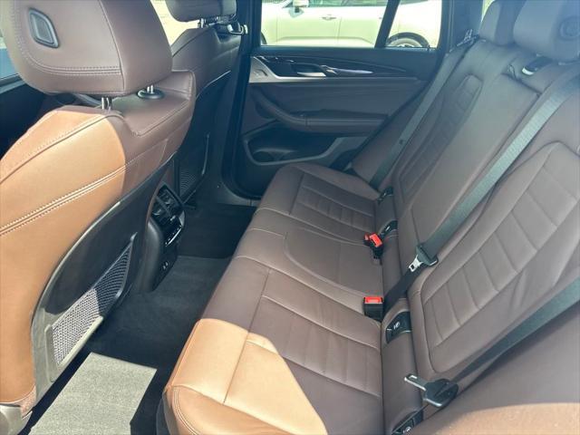 used 2022 BMW X4 car, priced at $50,989