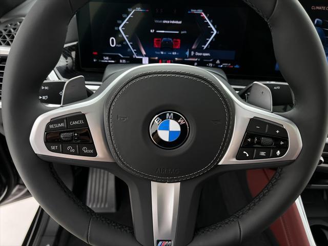 new 2025 BMW X6 car, priced at $88,875