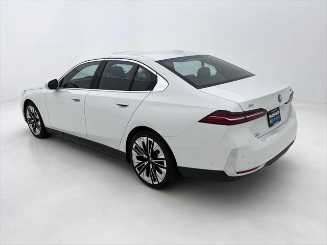 used 2025 BMW i5 car, priced at $64,989
