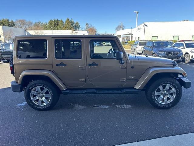 used 2015 Jeep Wrangler Unlimited car, priced at $23,989