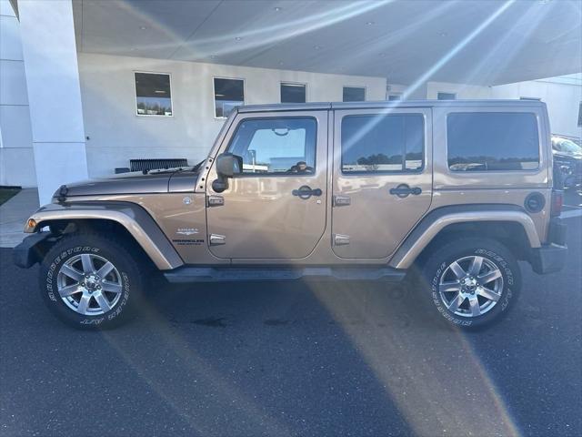 used 2015 Jeep Wrangler Unlimited car, priced at $23,989