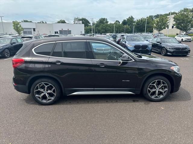 used 2018 BMW X1 car, priced at $19,989