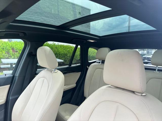 used 2018 BMW X1 car, priced at $19,989
