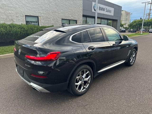 used 2025 BMW X4 car, priced at $55,989