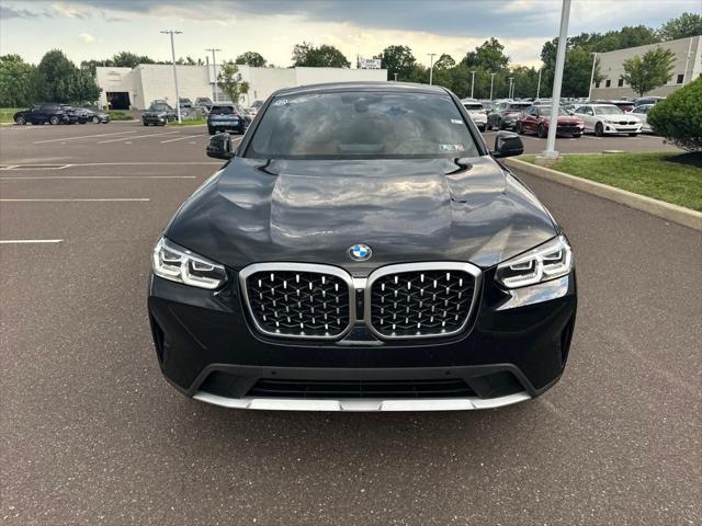 used 2025 BMW X4 car, priced at $55,989
