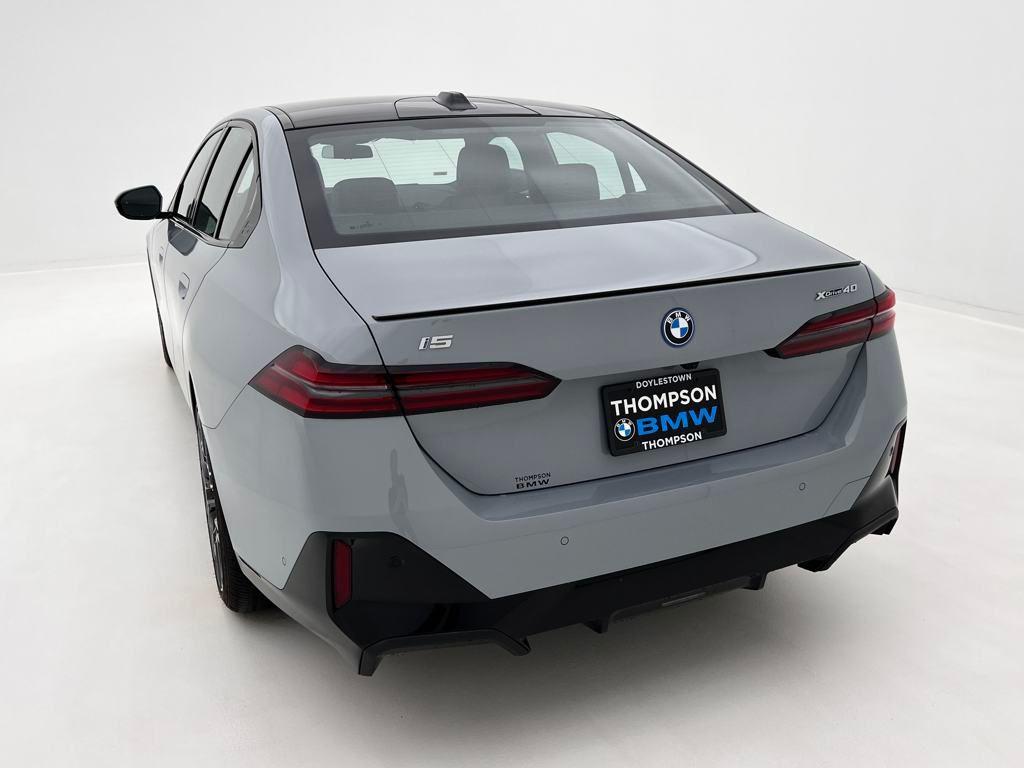 used 2025 BMW i5 car, priced at $64,989