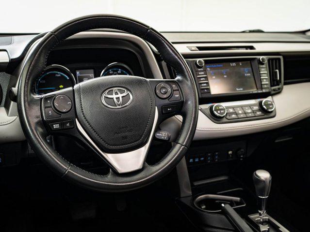 used 2018 Toyota RAV4 Hybrid car, priced at $28,598