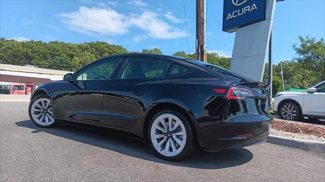 used 2023 Tesla Model 3 car, priced at $24,495