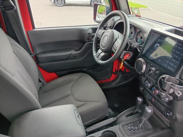 used 2015 Jeep Wrangler Unlimited car, priced at $16,495