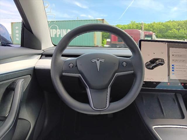used 2023 Tesla Model 3 car, priced at $34,495