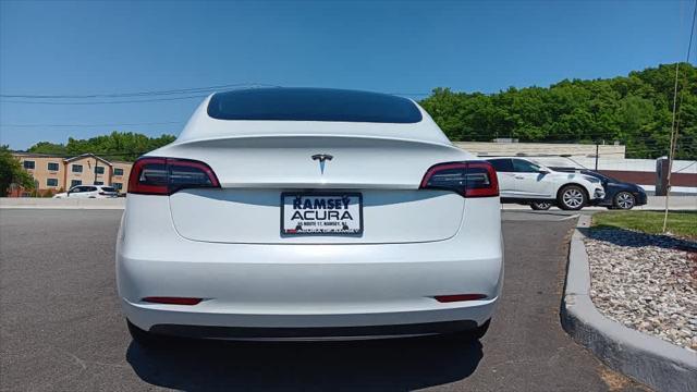 used 2023 Tesla Model 3 car, priced at $29,445