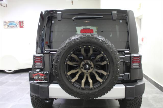 used 2015 Jeep Wrangler Unlimited car, priced at $21,995