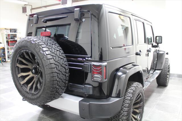 used 2015 Jeep Wrangler Unlimited car, priced at $21,995