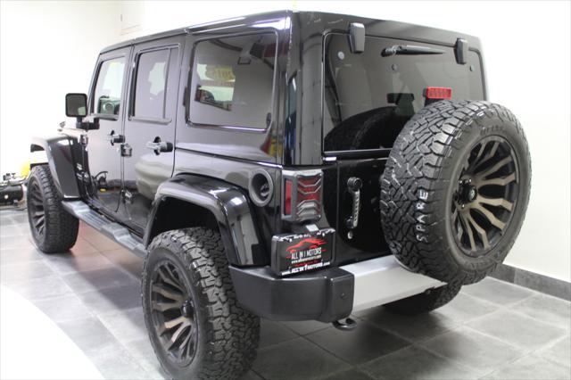 used 2015 Jeep Wrangler Unlimited car, priced at $21,995