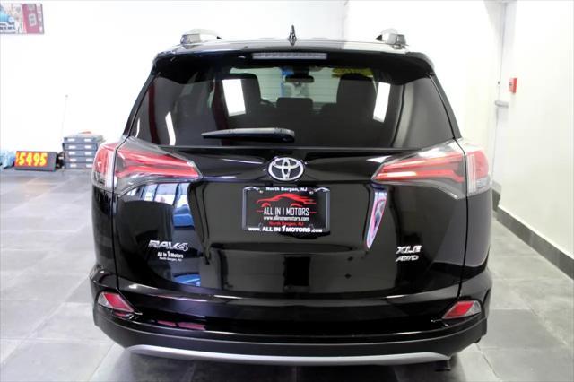 used 2018 Toyota RAV4 car, priced at $15,995