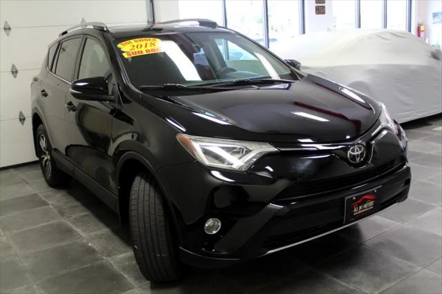 used 2018 Toyota RAV4 car, priced at $15,995