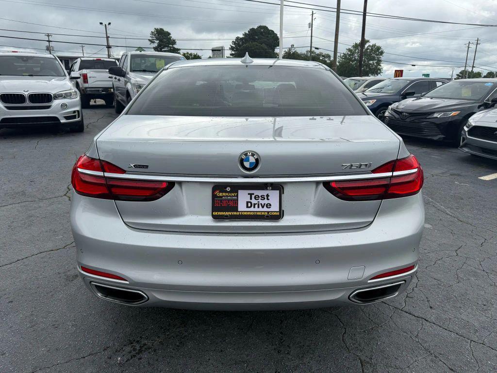 used 2016 BMW 750 car, priced at $18,399