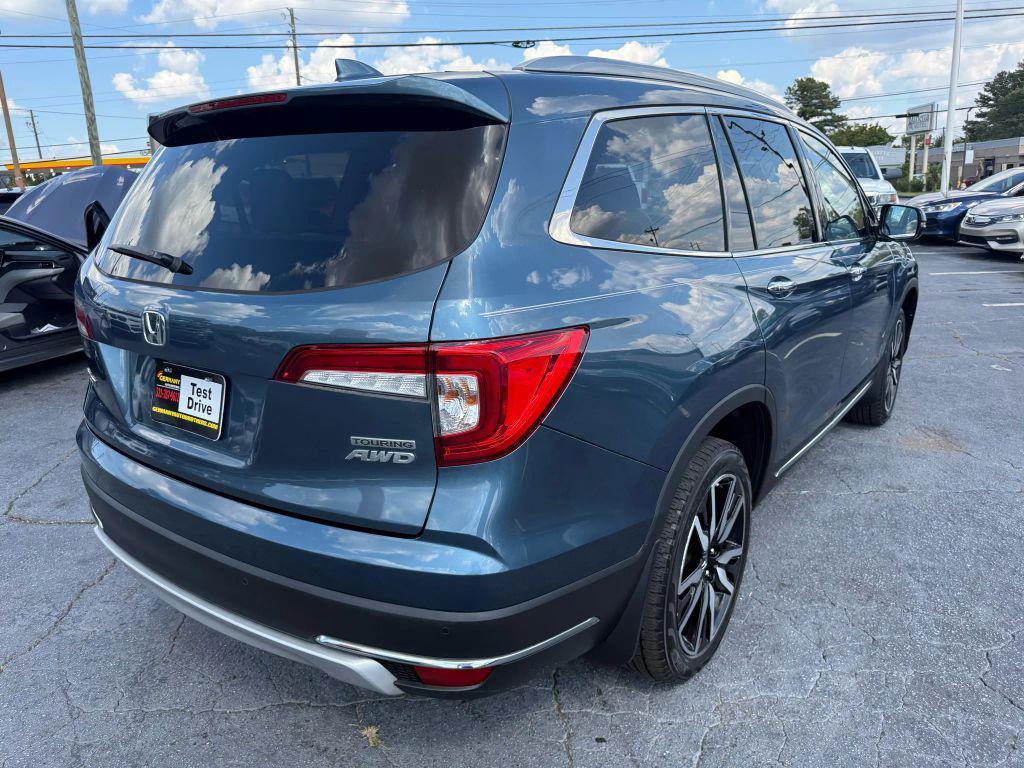 used 2021 Honda Pilot car, priced at $25,999