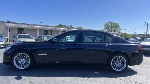 used 2015 BMW 750 car, priced at $16,599