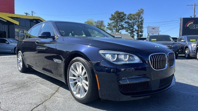 used 2015 BMW 750 car, priced at $16,599