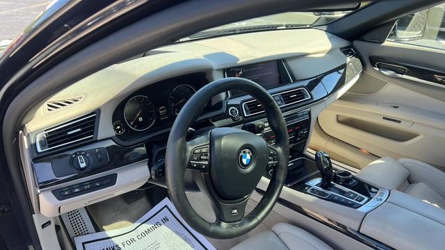 used 2015 BMW 750 car, priced at $16,599