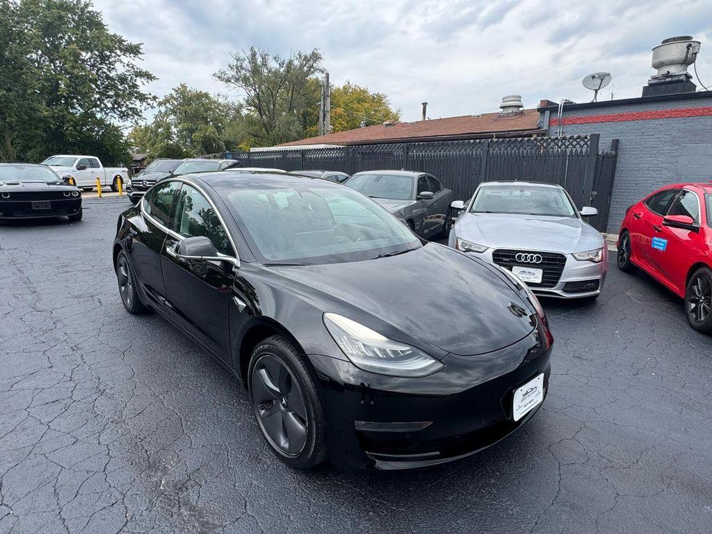 used 2019 Tesla Model 3 car, priced at $14,495