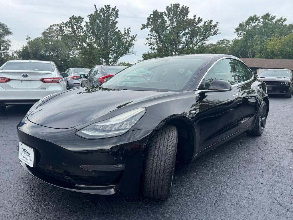 used 2019 Tesla Model 3 car, priced at $14,495