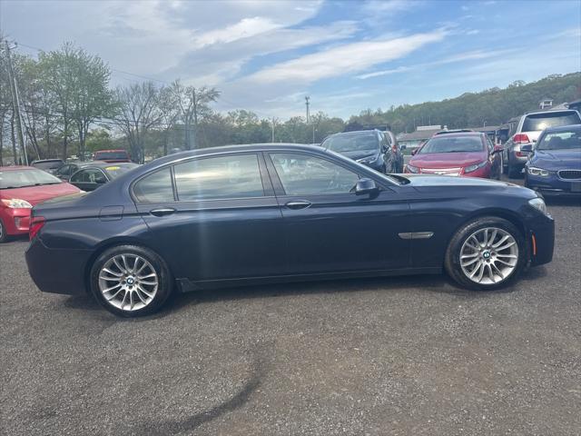 used 2013 BMW 750 car, priced at $14,479
