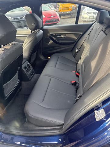 used 2018 BMW 330 car, priced at $14,998