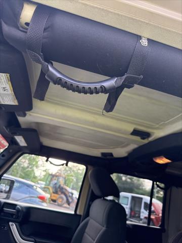 used 2012 Jeep Wrangler Unlimited car, priced at $12,998