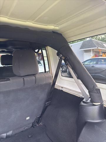 used 2012 Jeep Wrangler Unlimited car, priced at $12,998