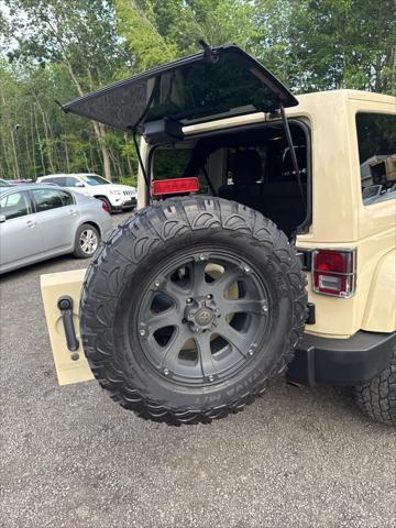 used 2012 Jeep Wrangler Unlimited car, priced at $12,998