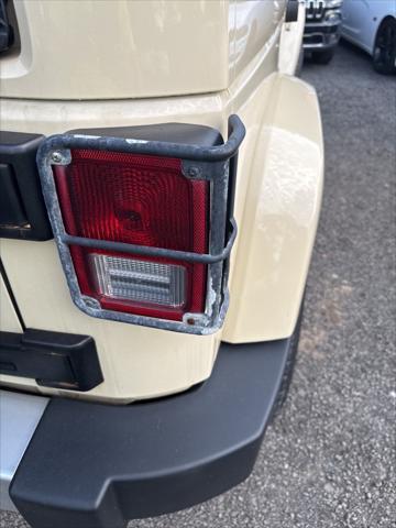 used 2012 Jeep Wrangler Unlimited car, priced at $12,998