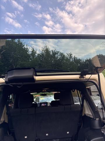 used 2012 Jeep Wrangler Unlimited car, priced at $12,998